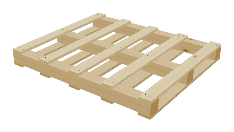 A wood pallet on 4x4 skids with deck boards on top.